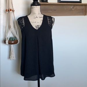 Black sleeveless top